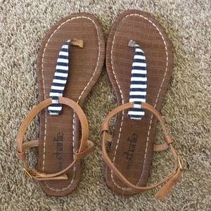 Blue and white striped sandals.